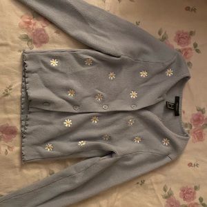 Medium never worn blue long sleeve flower pattern with buttons.